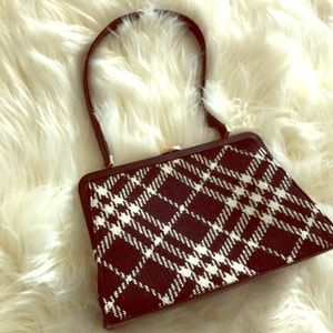 Burberry wool pocket book .